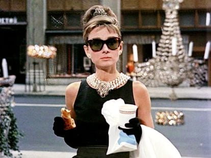 Audrey Hepburn, in front of Tiffany's jewelry store in the opening sequence of 'Breakfast at Tiffany's'.