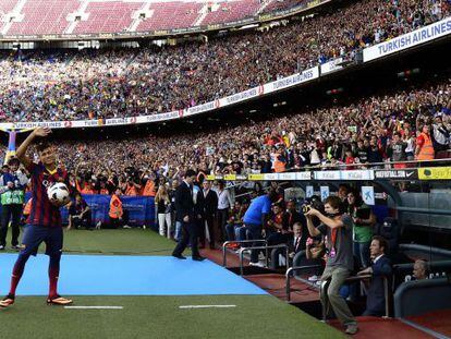 FC Barcelona&#039;s new player Brazilian Neymar da Silva Santos Junior waves during his presentation at Camp Nou stadium in Barcelona.