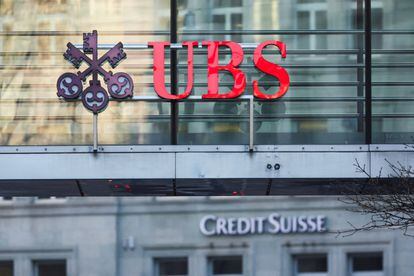 Logos of Swiss banks UBS and Credit Suisse are seen in Zurich, Switzerland March 20, 2023