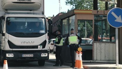 Vehicles undergoing checks at the border.