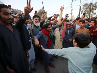 Supporters of the convicted former prime minister Imran Khan's Pakistan Tehrik-e-Insaf (PTI) political party dance, in Peshawar, Pakistan, February 09, 2024.