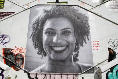 A big collage with photo of Deputy Mayor of Rio de Janeiro Marielle Franco is seen in the stairwell of Cristiano Viana Street, in the neighborhood of Pinheiros, Sao Paulo, on the 21 of march 2018.