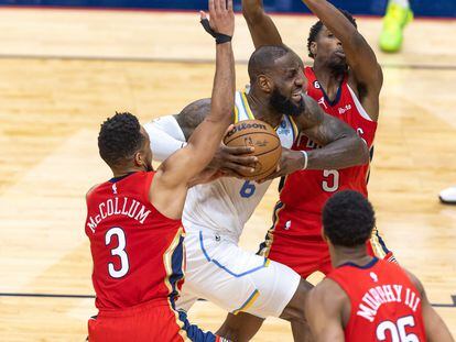 Los Angeles Lakers forward LeBron James (6) is fouled by New Orleans Pelicans forward Herbert Jones (5) as he goes to the basket during the second half at Smoothie King Center.