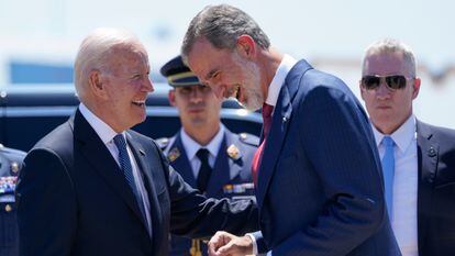 President Joe Biden talks with Spain's King Felipe VI at Madrid's Torrejón Air Base on Tuesday.