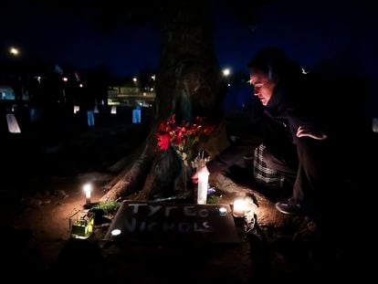 People attend a candlelight vigil for Tyre Nichols, who died after being beaten by Memphis police officers, in Memphis, Tenn., Thursday, Jan. 26, 2023.