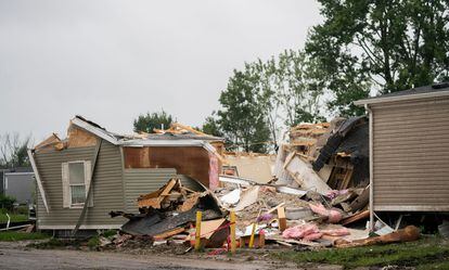 A home is damaged in Newport, Michigan, after a heavy band of storms hit the region