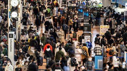 Travelers at Tokyo’s Haneda International Airport; December 29, 2022