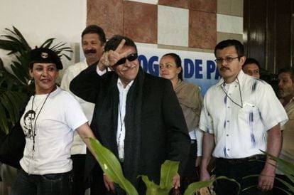 FARC negotiator Jesús Santrich gestures as he follows Dutch-born rebel Tanja Nijmeijer on Tuesday.