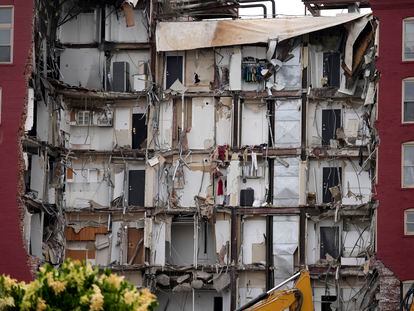 Seen is the damage from a collapsed apartment building, Monday, June 5, 2023, in Davenport, Iowa.