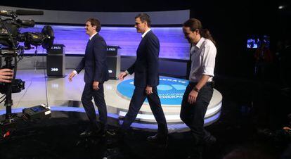 Rivera, Sánchez and Iglesias arriving at the debate.