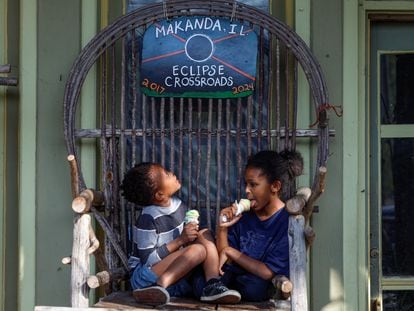 Kids eat ice cream in Makanda, population 600, which is at the crossroads of the 2017 and 2024 eclipses,  on Sunday.