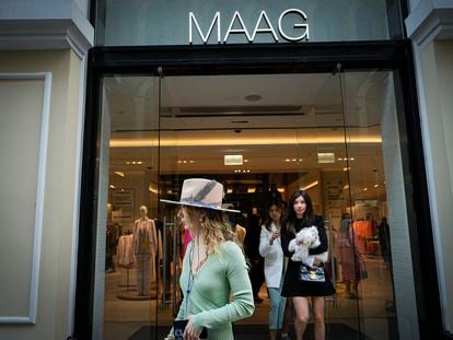 A woman exits a newly opened Maag store, a former Zara flagship store, in Moscow, Russia, on April 27, 2023.