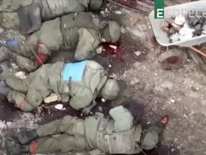 A still from a video that allegedly shows executed Russian troops on the front lines in Luhansk.