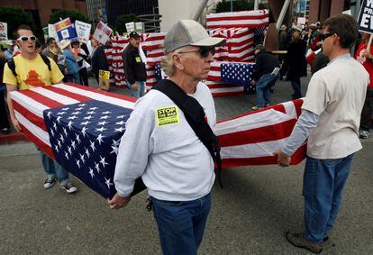 Protesters carry flag-draped mock coffins as they prepare to take part in an anti-Iraq War march in Los Angeles in January 2007.