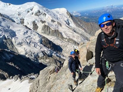 Two climbers, with Mont Blanc in the background.