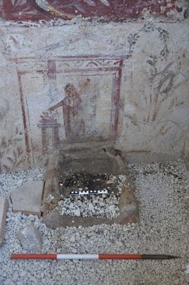 Burnt remains on the altar of Lararium. ARCHAEOLOGICAL PARK OF POMPEII