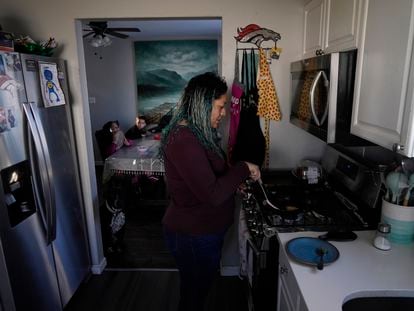 Betty Rivas prepares breakfast for her family Thursday, February 23, 2023, in Commerce City, Colorado.