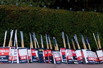 Strike signs await striking SAG-AFTRA actors and Writers Guild of America (WGA) outside Disney Studios in Burbank, California, on July 25, 2023.