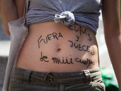 &quot;Keep judges and priests out of my body,&quot; reads the stomach of a woman at a recent protest against proposed changes to abortion laws.