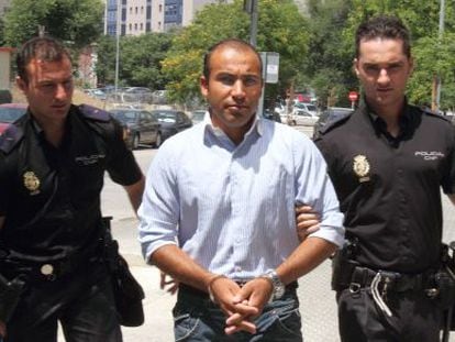 Hokman Joma arrives in court in Seville in 2010 after throwing a shoe at Turkish premier Recep Tayyip Erdogan. 