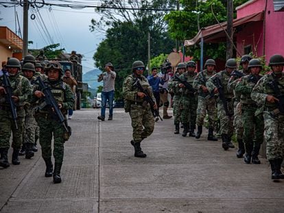 Soldiers patrol the municipality of Comalapa, Mexico, in September 2023.