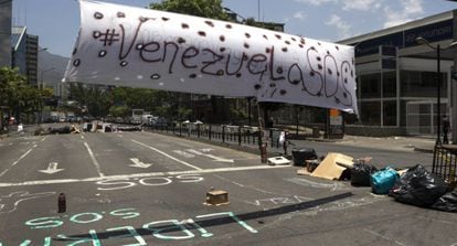 A roadblock is set up in front of the United Nations office in Caracas.