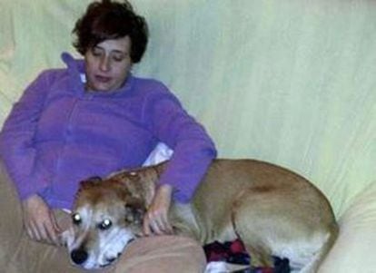 Teresa Romero pictured at home with her dog Excalibur.