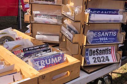 Bumper stickers supporting Florida Governor Ron DeSantis on sale at former President Donald Trump's rally in Conroe, Texas, on January 29, 2022.
