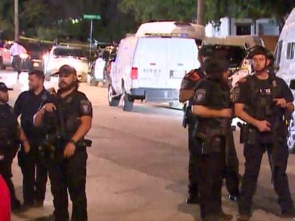 Police arrive on the scene of a deadly shooting late Monday, July 3, 2023 in Forth Worth, Texas.  Authorities say  gunfire erupted following a local festival in the Como neighborhood in the city's southwest.