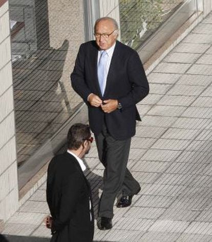 Pescanova's expected new chairman Juan Manuel Urgoit arrives at a shareholders' meeting.