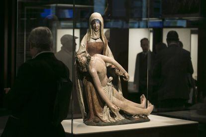 A Madonna and Christ carving on display at the CaixaForum exhibition.