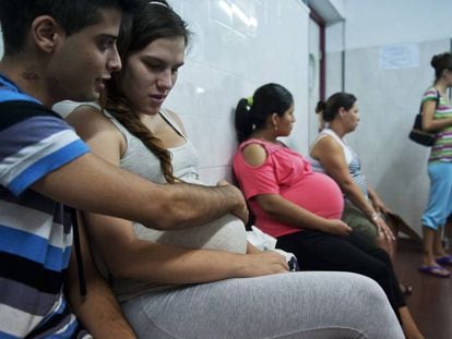 A young mother at a medical clinic in Buenos Aires.
