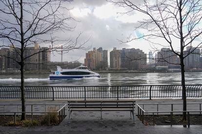 A commuter ferry makes its way down the East River on the the Upper East Side of the Manhattan borough of New York on Friday, Jan. 6, 2023, where woolly mammoth tusks were allegedly dumped in the mid 1900s.