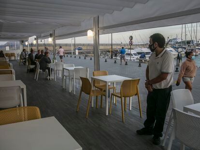 A near-empty restaurant in the port of Corralejo, Fuerteventura in Spain's Canary Islands.