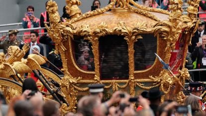 A hologram of Elizabeth II at her coronation in the gilded carriage as she passes through the streets of London to commemorate her Platinum Jubilee in June 2022. 