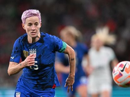 Megan Rapinoe runs for the ball during the Women's friendly football match between England and the U.S. at the Wembley Stadium, in London, in 2022.