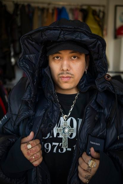 Storm Pablo poses in a TAKAHIROMIYASHITA The Soloist jacket used by Bad Bunny in the video for ‘Ignorantes.’ 