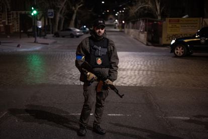 Gennadiy Raskin, a Jewish member of Ukraine's territorial defense forces, during a night patrol in downtown Odessa.