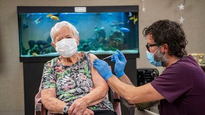 A woman in Lucerne, Switzerland receiving the Pfizer-BioNTech vaccine on Wednesday.