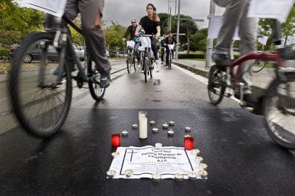 Members of the Catalonia Bicycle Club mourn the loss of a bike lane.