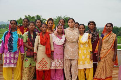 Nasreen Sheikh with workers at Local Women Handicrafts in Nepal.