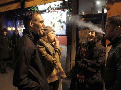 Smokers outside a Madrid bar.