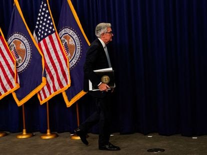 Federal Reserve Board Chairman Jerome Powell leaves a news conference after Powell, following the Federal Open Market Committee meeting on interest rate policy in Washington.