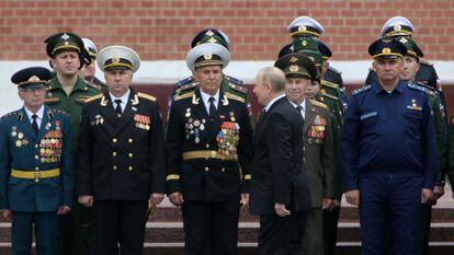 Vladimir Putin presides over a ceremony at Moscow’s Tomb of the Unknown Soldier.