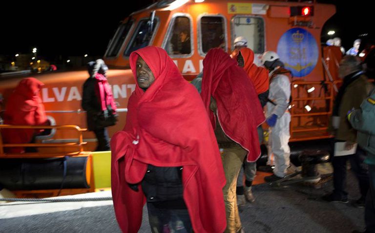 Sub-Saharan migrants arrive iin Granada after being rescued at sea.