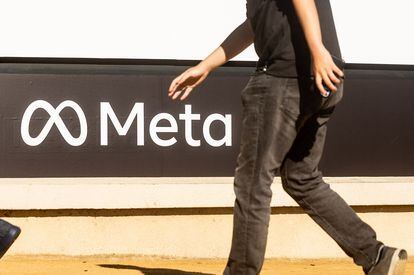 A man walks past the Meta headquarters in Menlo Park, California in October 2021.