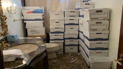 This undated image, released by the US District Court Southern District of Florida, attached as evidence in the indictment against former US president Donald Trump shows stacks of boxes in a bathroom and shower allegedly in the Lake Room at Mar-a-Lago, the former presidents private club.