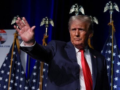 Donald Trump waves at the Club 47 USA event in West Palm Beach, Florida, October 11, 2023.