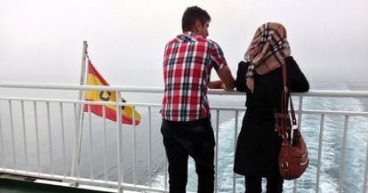 Two Syrian refugees on board a boat headed from Melilla to Malaga.