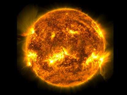 An X1.0-class solar flare on the left side of the Sun on January 10, 2023, captured by NASA's Solar Dynamics Observatory.